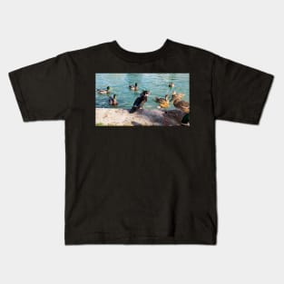 Angry Wood Duck Standing Next To A Pond With a Mallard Duck Flock Kids T-Shirt